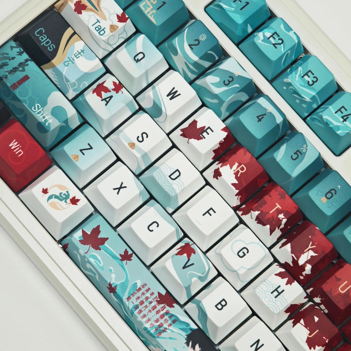 Close-up of the Dan Heng character keycap design, side-engraved detail