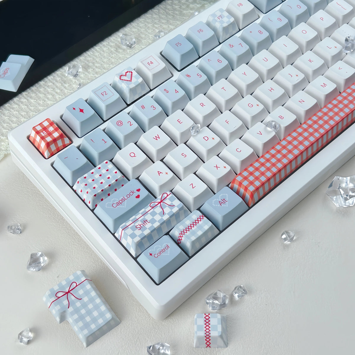 Close-up of the Sweet Bobo heart and bow keycap design
