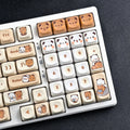 Bubu & Yier accent keycaps mixed into a keyboard with matching PBT keycaps installed