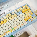 Full Mango Yogurt Bear keycap set laid out