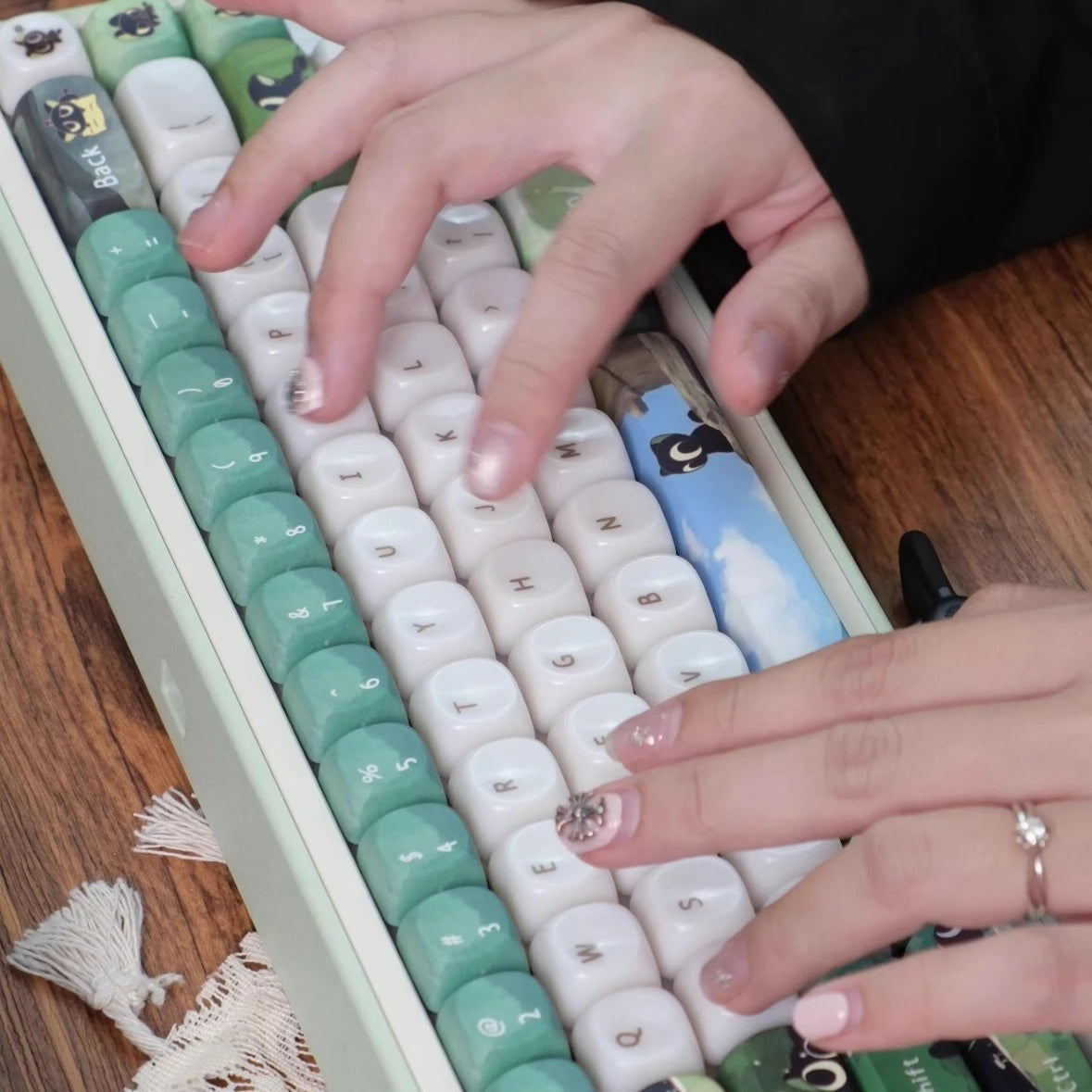 Black Cat keycaps shown from a different angle
