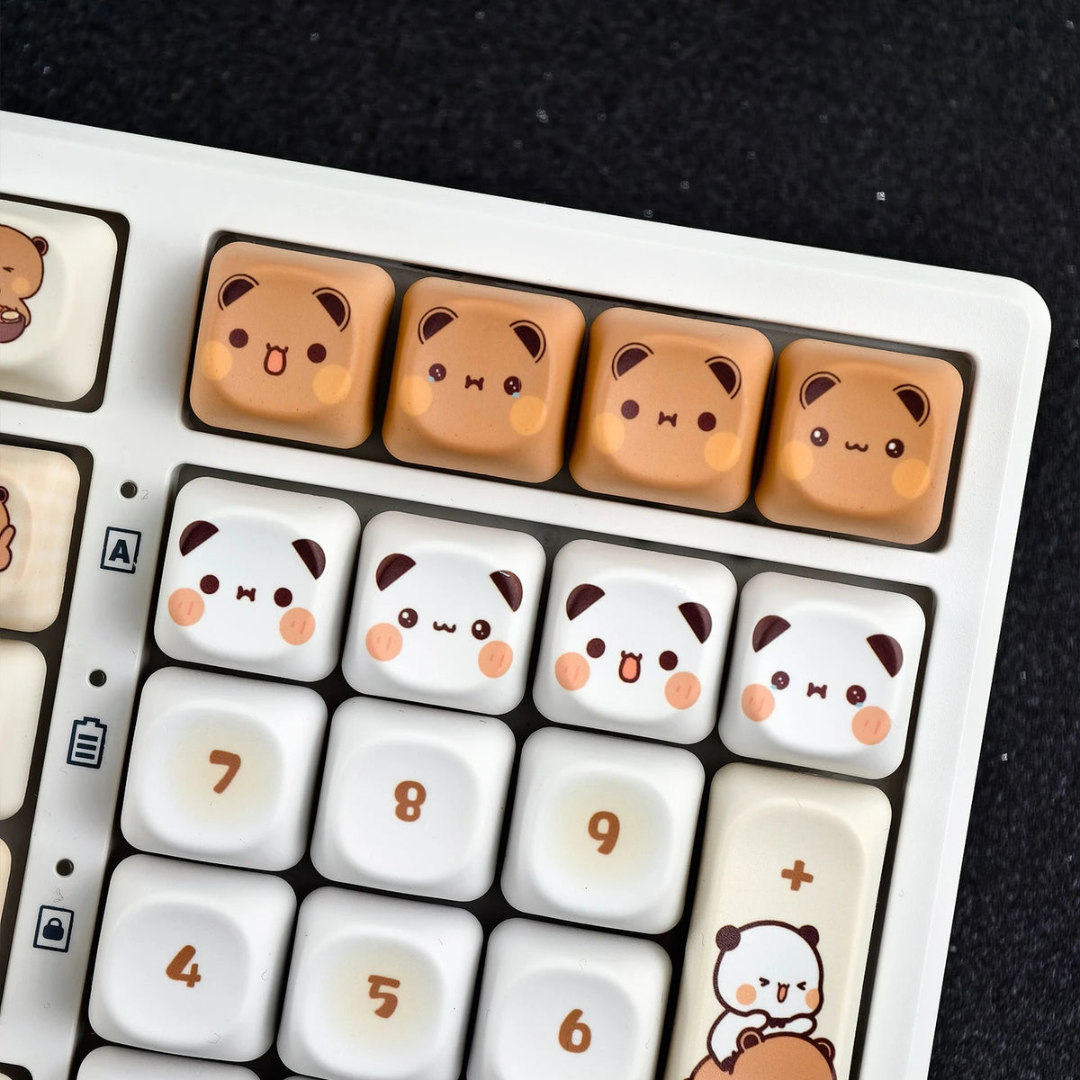 Bubu & Yier accent keycaps mixed into a keyboard with matching PBT keycaps installed