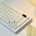 Whiskers Cat-Ear Keycap Set, 124-piece milky white PBT keycaps with a cat-ear accent key, MOA profile