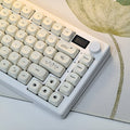 Whiskers Cat-Ear Keycap Set, 124-piece milky white PBT keycaps with a cat-ear accent key, MOA profile