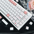 Close-up of the Sweet Bobo bow accent keycap