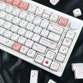 Full Sweet Bobo red and white keycap set laid out