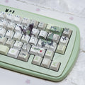 Bamboo & Butterfly keycaps shown from a different angle