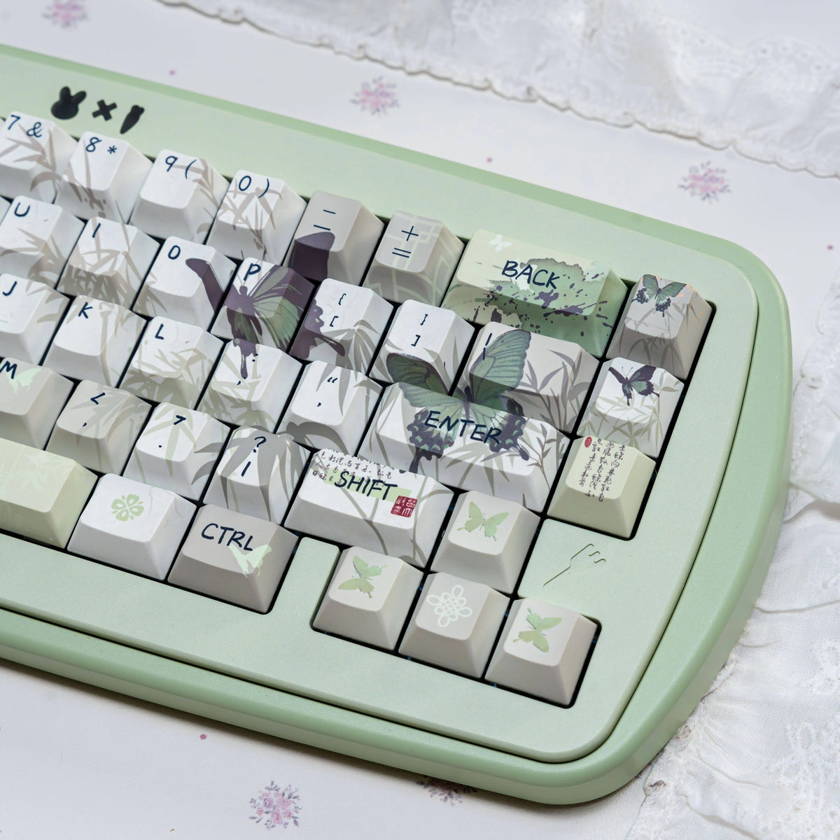 Bamboo & Butterfly keycaps shown from a different angle