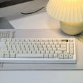 Whiskers Cat-Ear Keycap Set, 124-piece milky white PBT keycaps with a cat-ear accent key, MOA profile