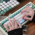 Close-up of the ceramic-textured finish on the Black Cat Keycap Set
