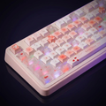 Strawberry Patch Keycap Set - PBT on a dark violet-lit backdrop
